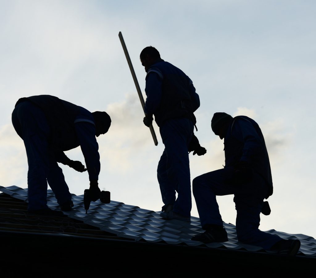 Building roof construction site teamwork silhouette