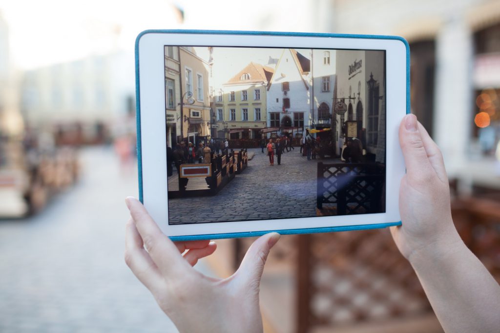 Making photo or video with pad of old street in Tallinn, Estonia