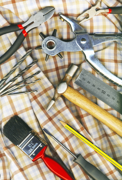 A set of tools on the workers check Shirt